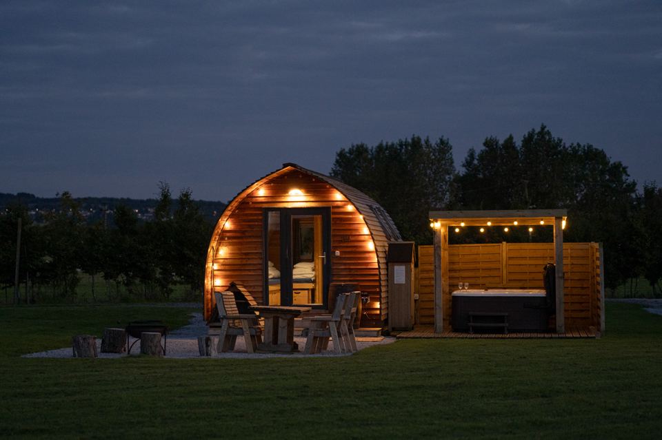 Cabin and hot tub at dusk