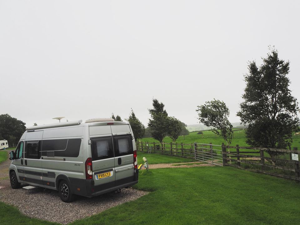 Motorhome beside paddock fence