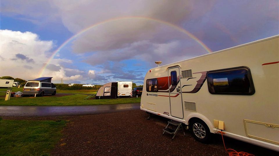 Rainbow over the caravan pitches