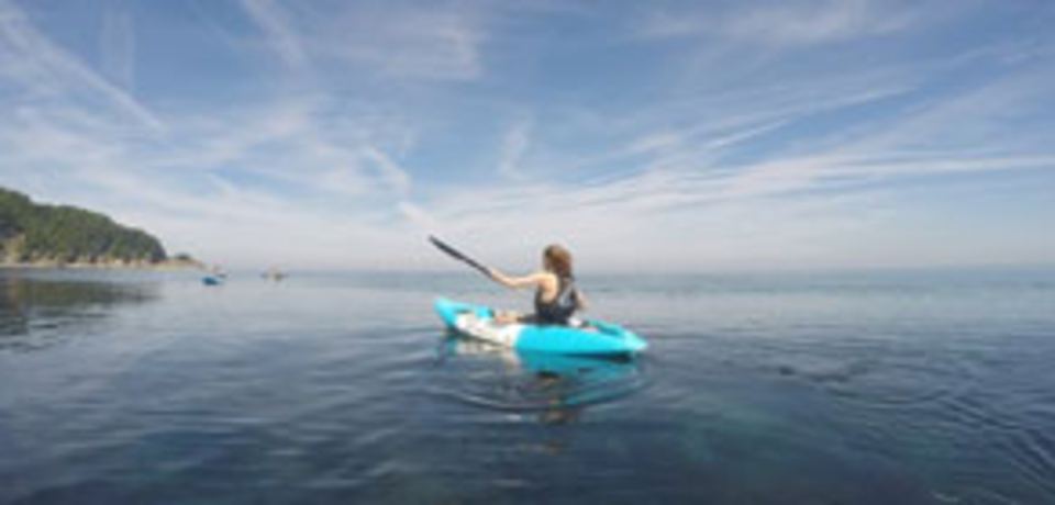 Kayaker on the calm sea