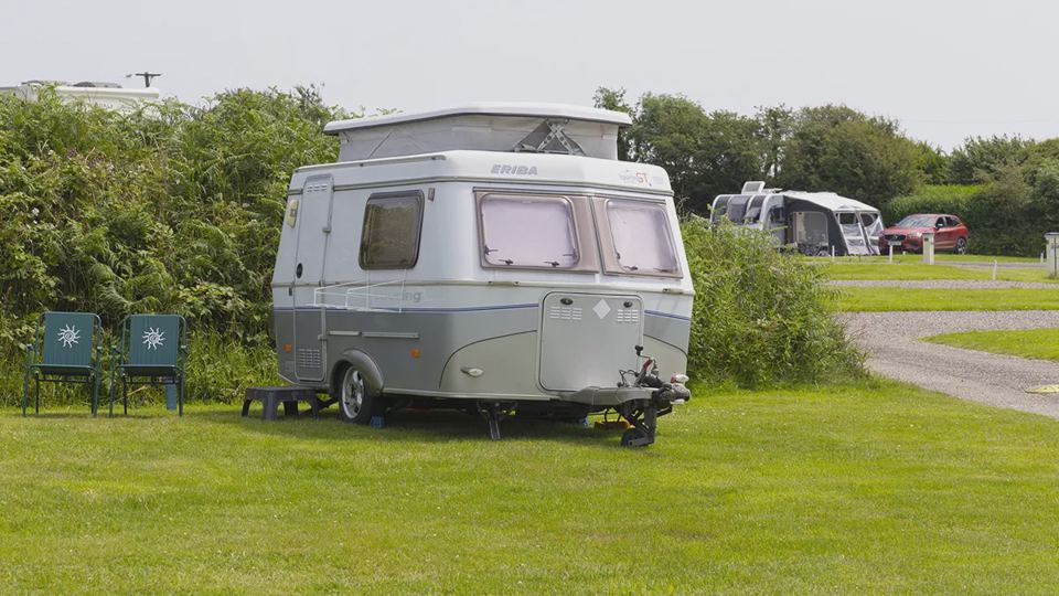 Caravan on the grass pitch