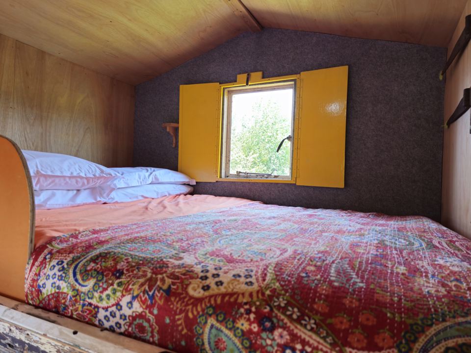 Double bed in a hut