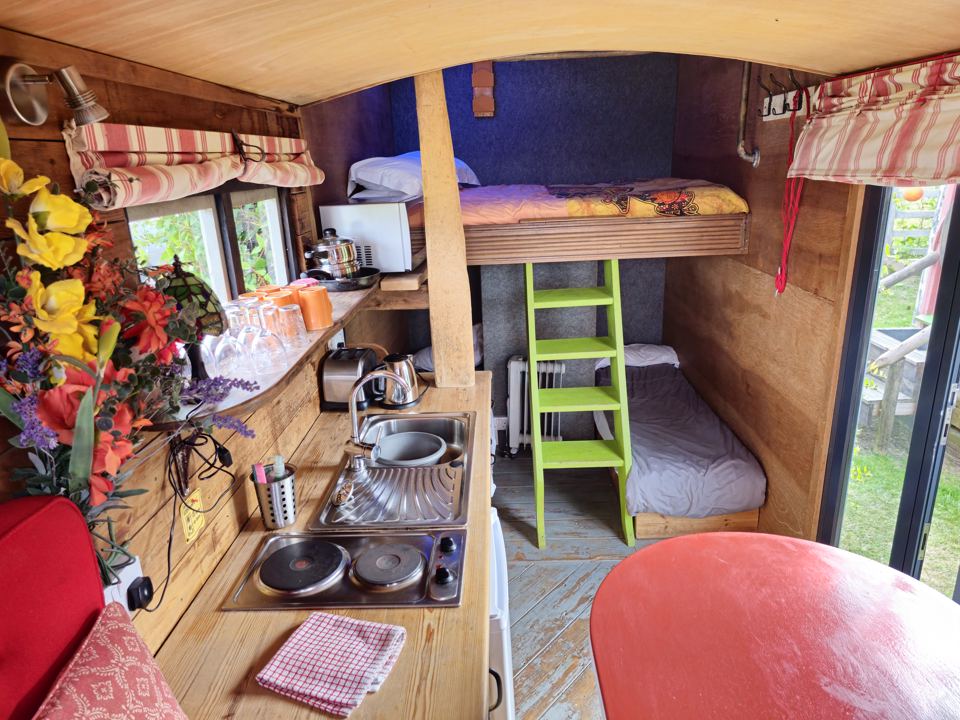 Inside a hut with bunks