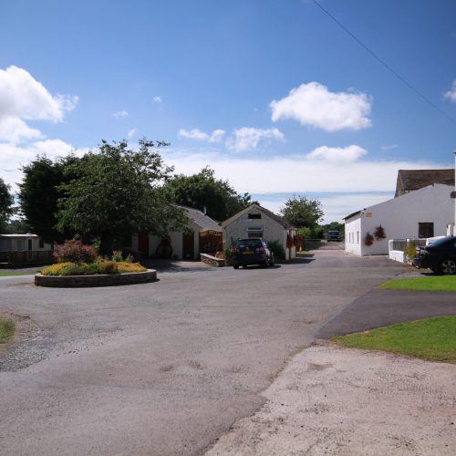 Park entrance and farm buildings