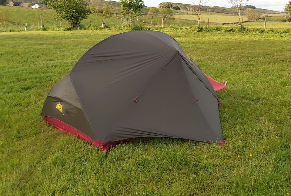 Tent pitched on short grass