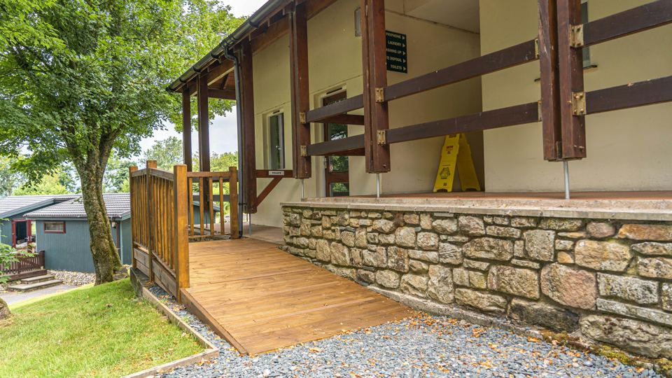 Lodge with decking on the gravel