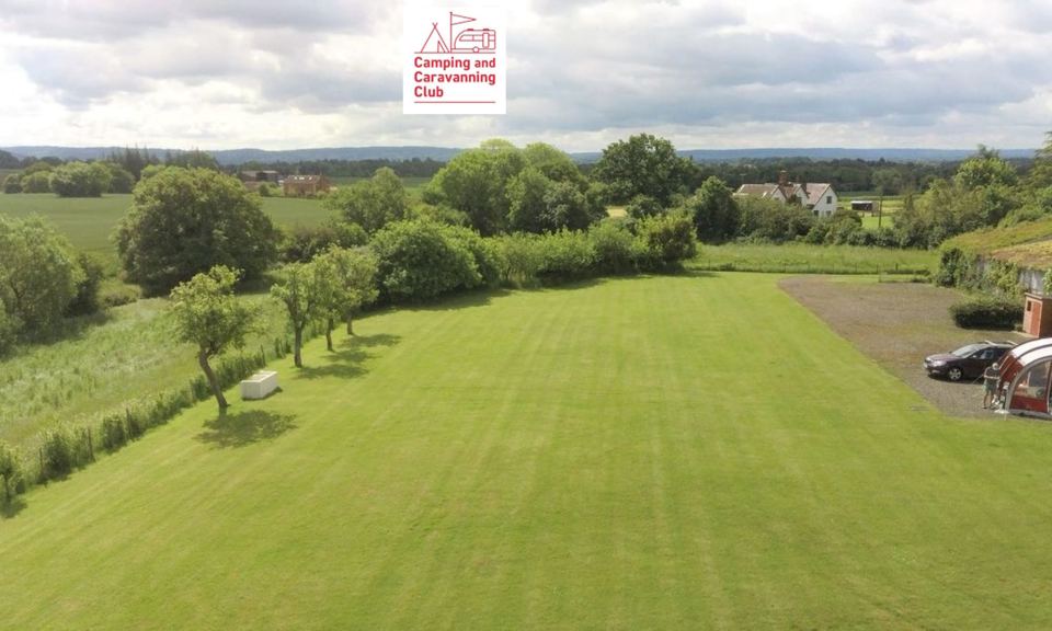 Mown lawn pitches with farmland views