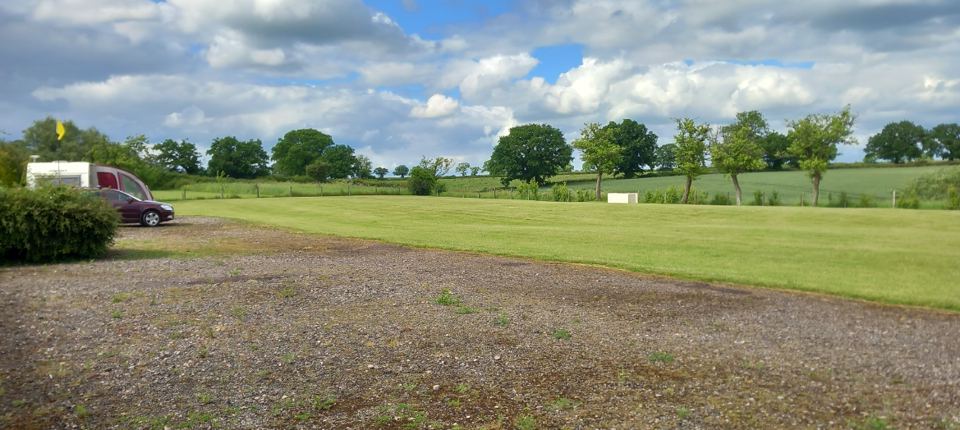 Grass and gravel pitches on the farm