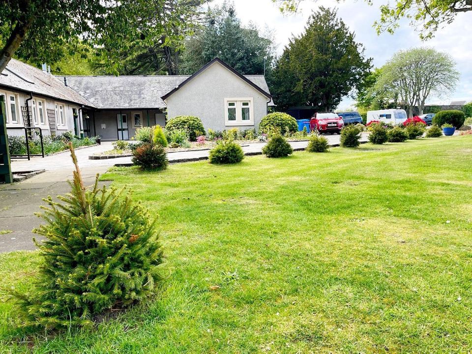 Facilities building and lawn
