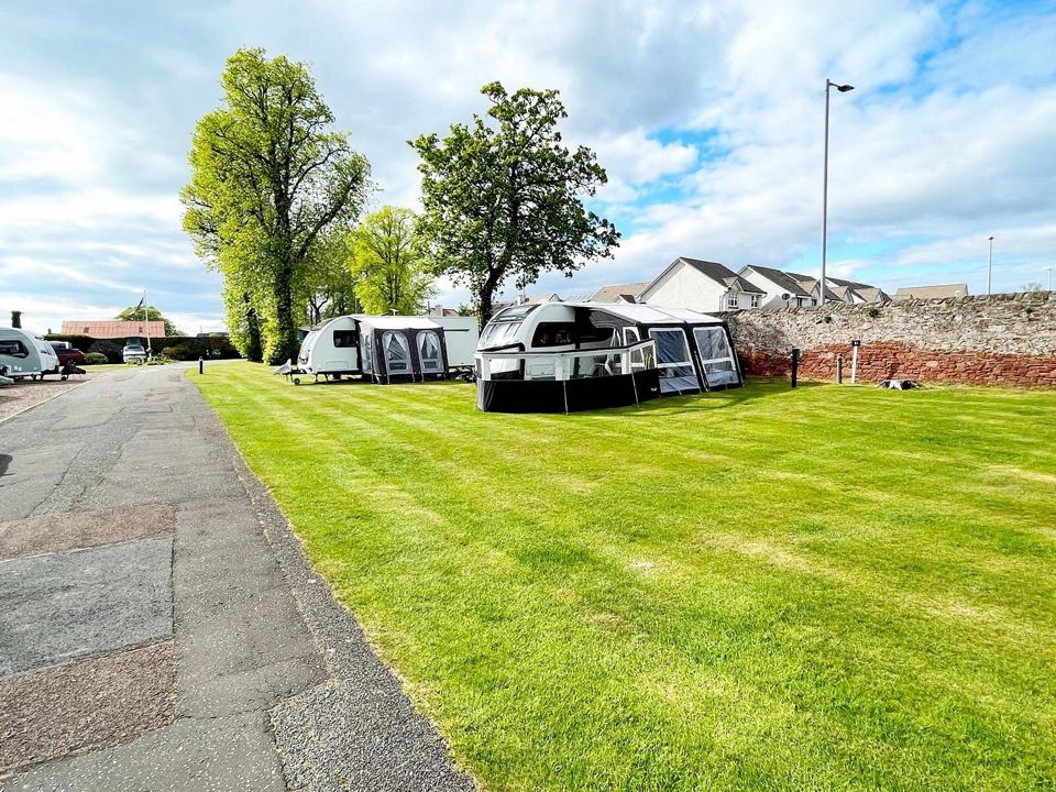 Grass pitches by the wall