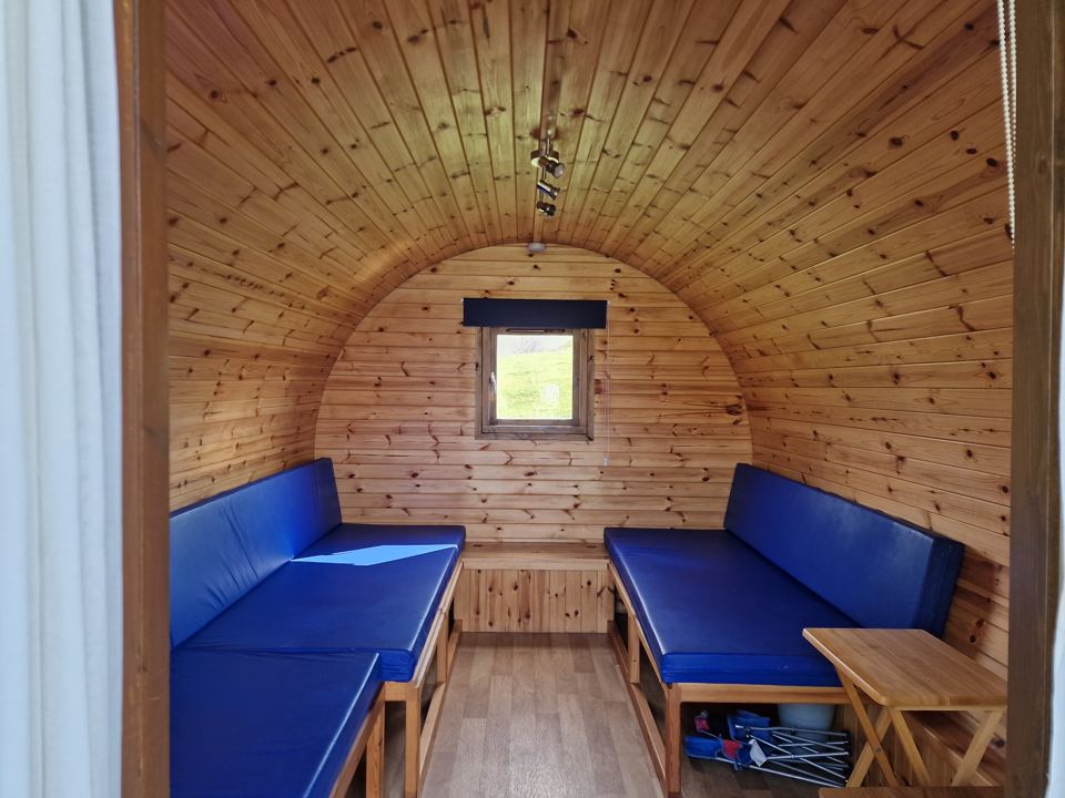 Pod interior with bench seats