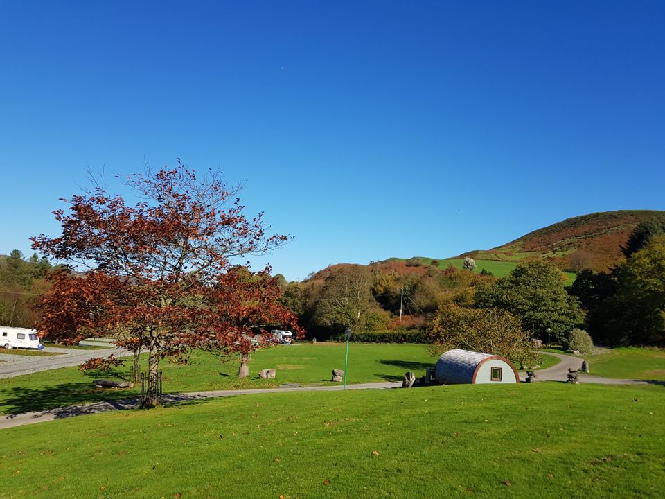 Open grass under the hills