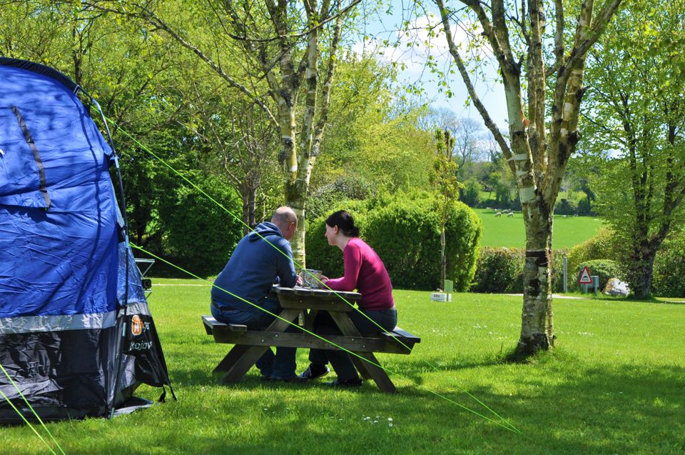 Picnic by a tent pitch
