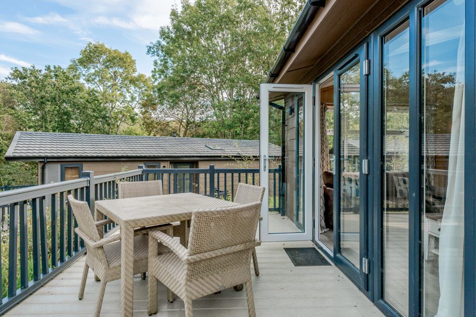 Lodge decking with table and chairs