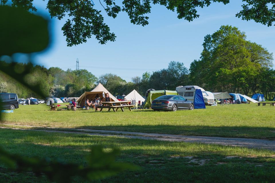 Tents and a tipi on the camping field
