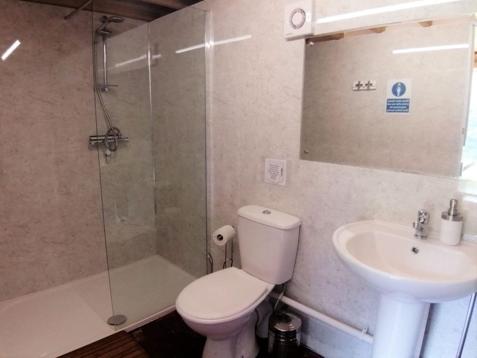Washroom with shower and basin