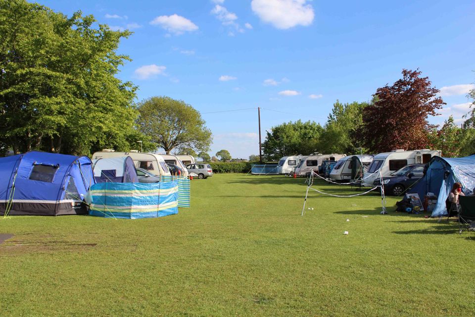 Tents and caravans on the field