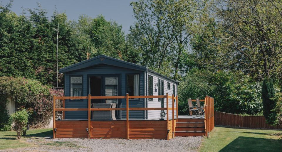 Lodge with decking and garden