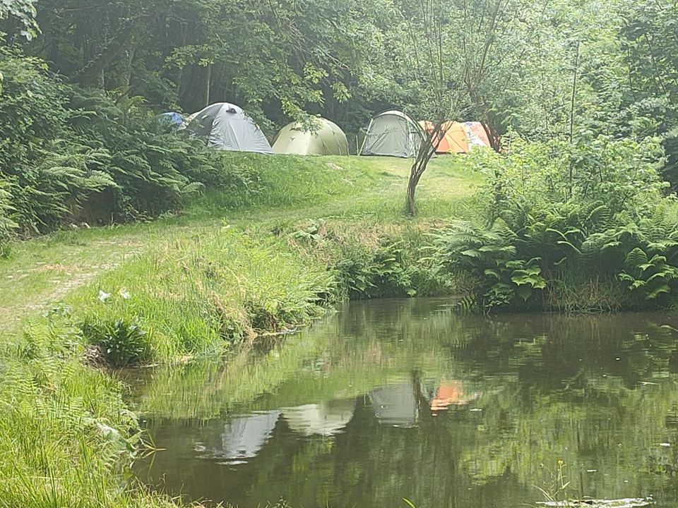 Tents beside the pond