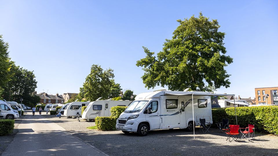 Motorhome pitches by hedge